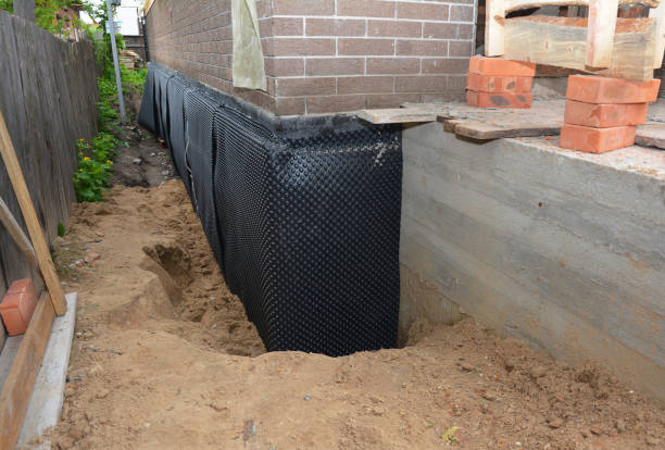 Happy homeowners after waterproofing job in Yacolt